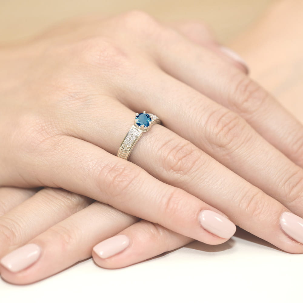 Gold Ring With London Topaz And Diamonds