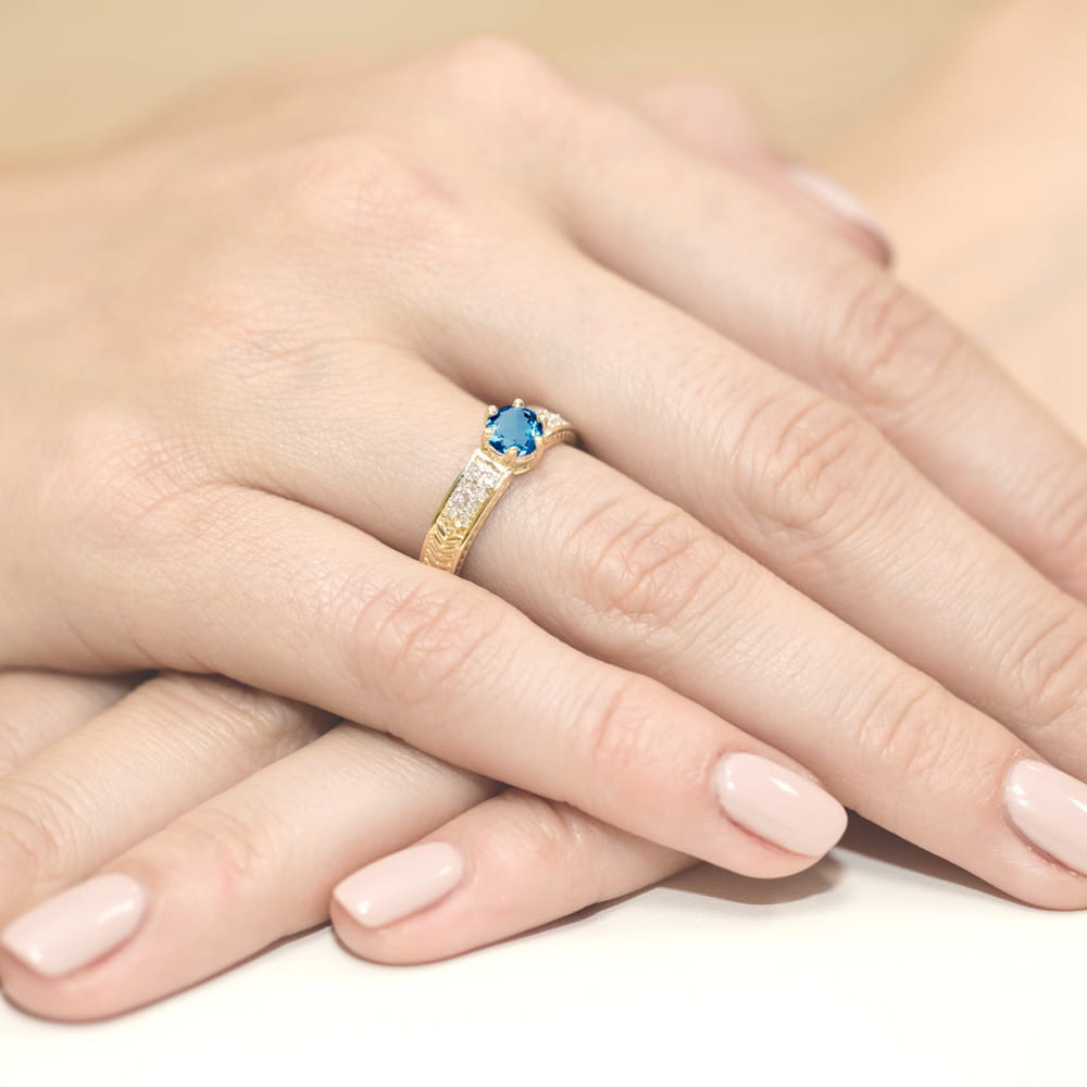 Gold Ring With London Topaz And Diamonds