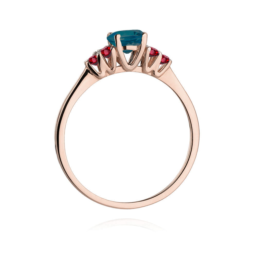 Gold Ring With London Topaz And Rubies