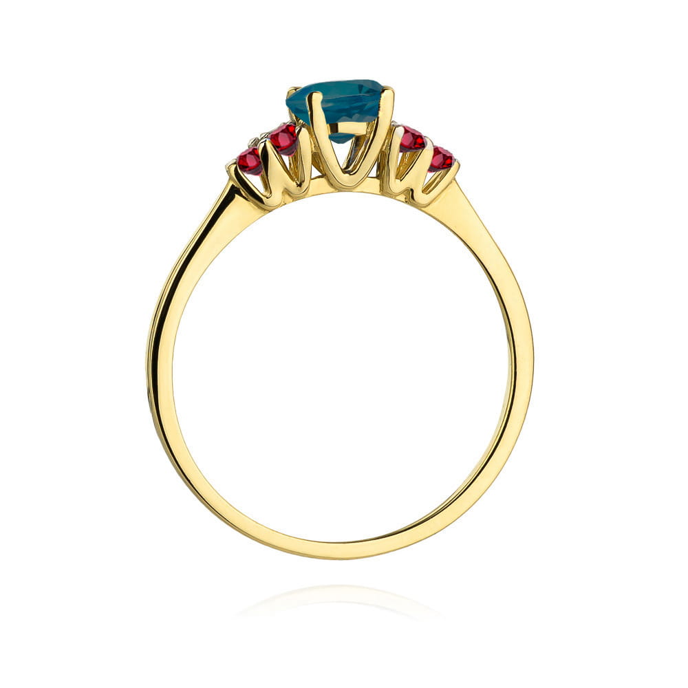 Gold Ring With London Topaz And Rubies