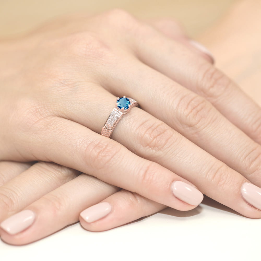 Gold Ring With London Topaz And Diamonds
