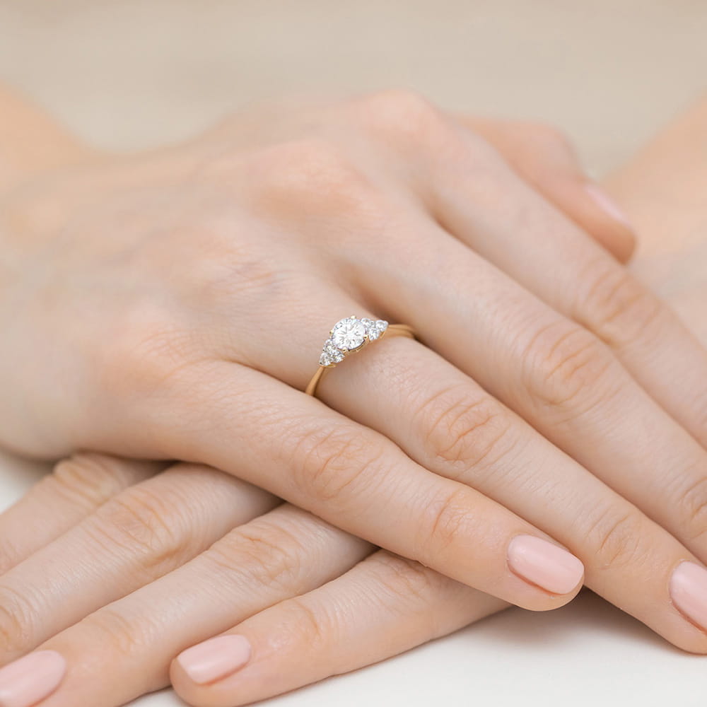 Gold Ring With White Sapphire And Diamonds