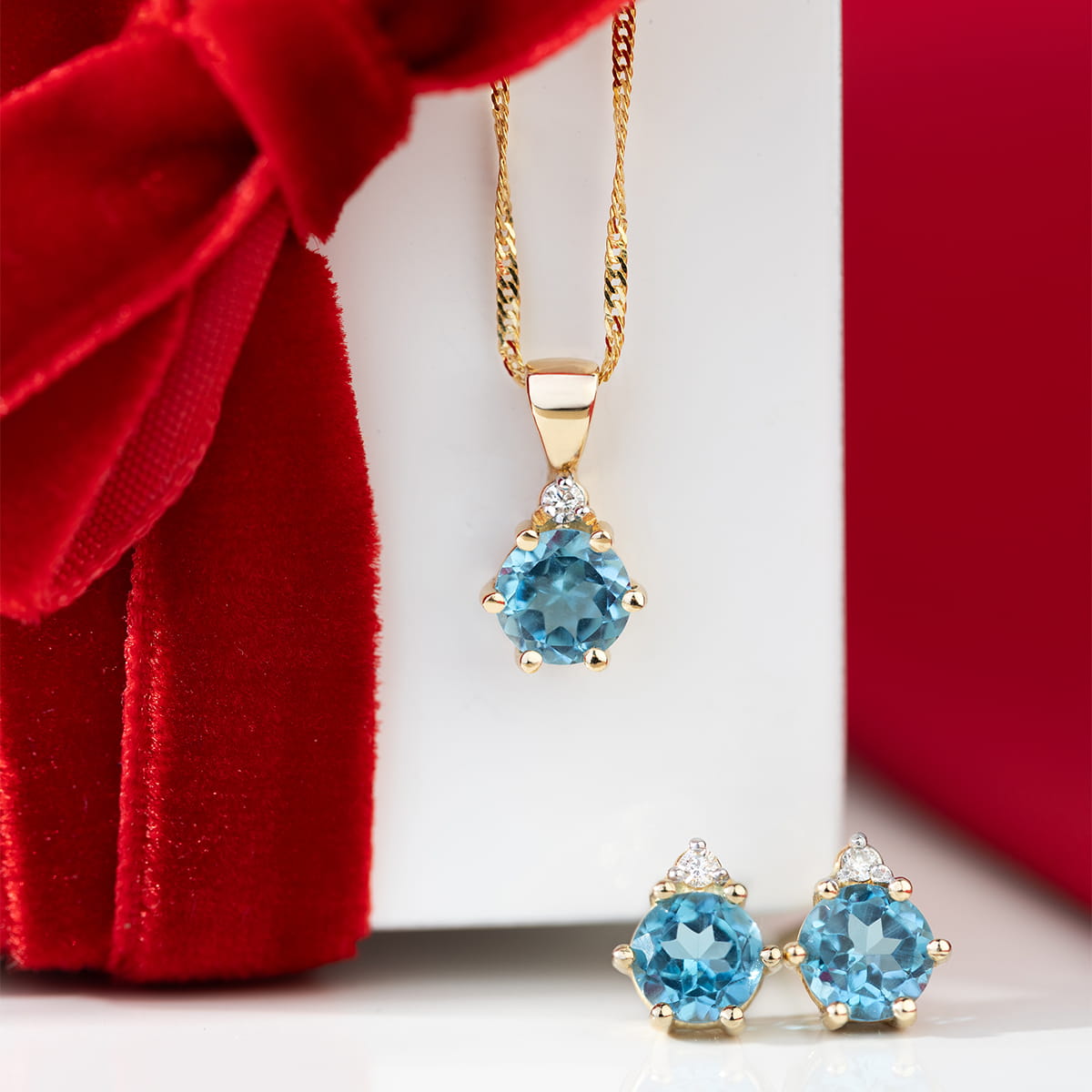 Gold Pendant With Topaz And Diamonds